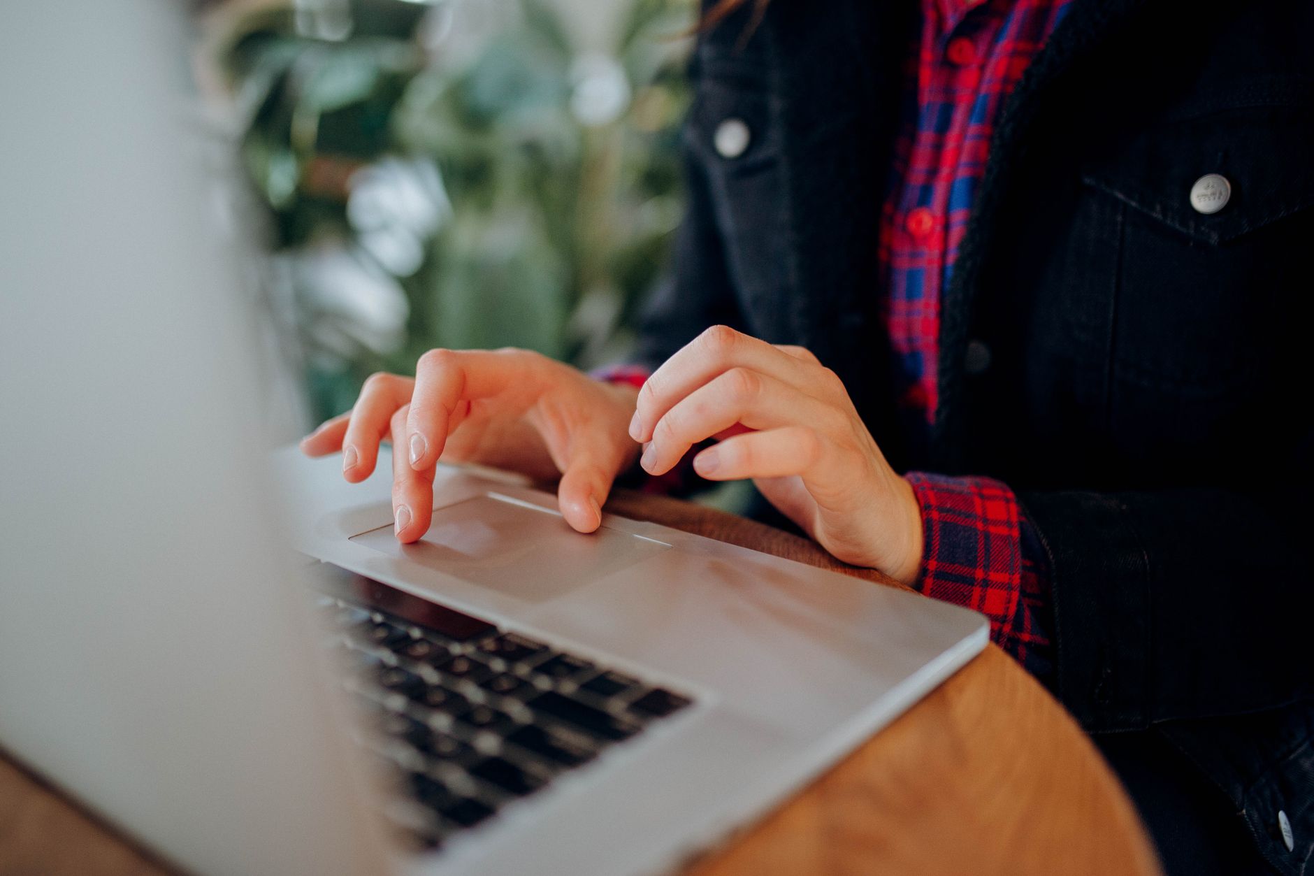 A person filling in a registration form on a laptop — traditional casino account creation requires an email, a password and entering your data